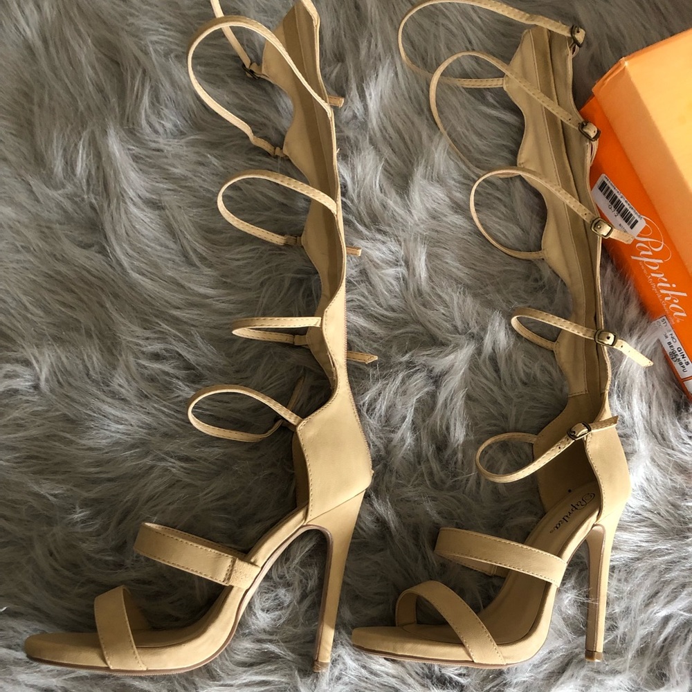 Knee-high, open-toe, gladiator heels